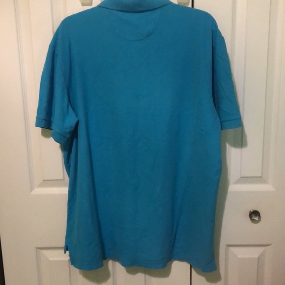 Classic fit world polo shirt in size Xl turquoise color the emblem is pink - Picture 4 of 7